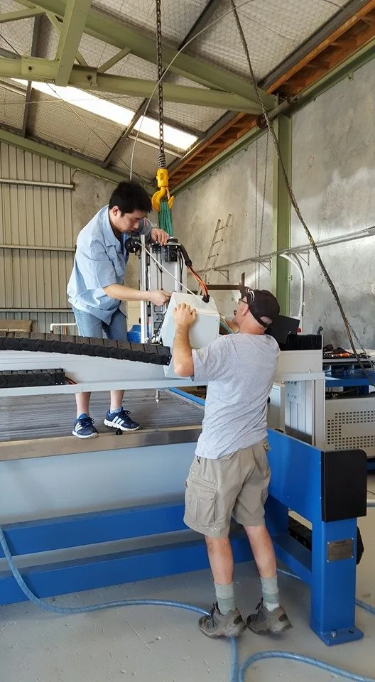 VICHOR engineer Mr Meng with Scott during the first VICHOR waterjet installation in New Zealand
